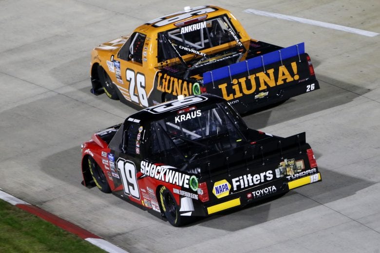 MARTINSVILLE, VIRGINIA - OCTOBER 30: Derek Kraus, driver of the #19 SHOCKWAVE/ENEOS Toyota, and Tyler Ankrum, driver of the #26 LiUNA! Chevrolet, race during the NASCAR Gander RV & Outdoors Truck Series NASCAR Hall of Fame 200 at Martinsville Speedway on October 30, 2020 in Martinsville, Virginia. (Photo by Brian Lawdermilk/Getty Images) | Getty Images