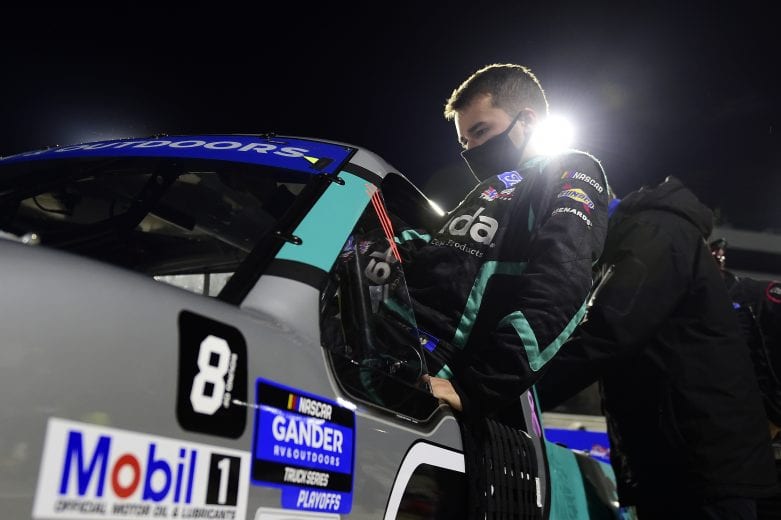 MARTINSVILLE, VIRGINIA - OCTOBER 30: Ben Rhodes, driver of the #99 Tenda Heal Ford, enters his truck to start the NASCAR Gander RV & Outdoors Truck Series NASCAR Hall of Fame 200 at Martinsville Speedway on October 30, 2020 in Martinsville, Virginia. (Photo by Jared C. Tilton/Getty Images) | Getty Images