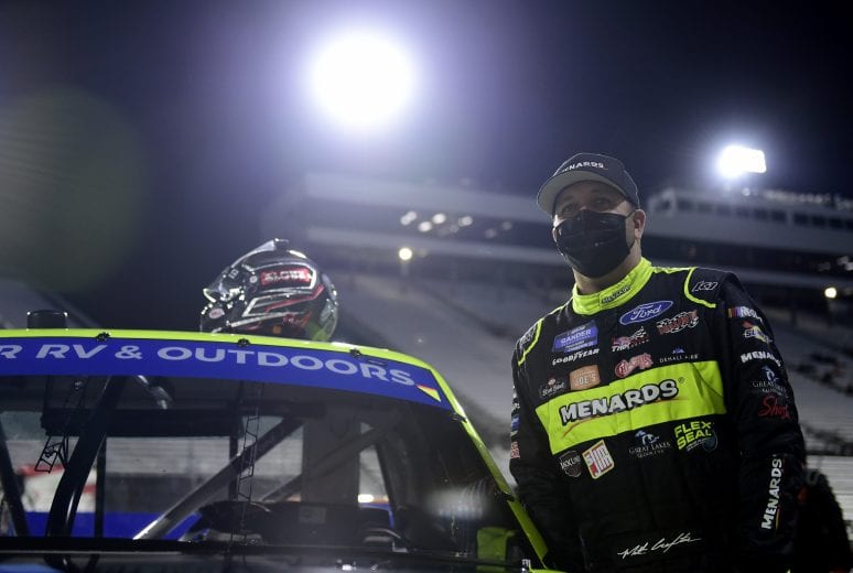 MARTINSVILLE, VIRGINIA - OCTOBER 30: Matt Crafton, driver of the #88 Denali Aire/Menards Ford, waits on the grid prior to the NASCAR Gander RV & Outdoors Truck Series NASCAR Hall of Fame 200 at Martinsville Speedway on October 30, 2020 in Martinsville, Virginia. (Photo by Jared C. Tilton/Getty Images) | Getty Images