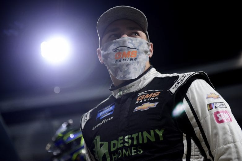 MARTINSVILLE, VIRGINIA - OCTOBER 30: Brett Moffitt, driver of the #23 Destiny Homes Chevrolet, waits on the grid prior to the NASCAR Gander RV & Outdoors Truck Series NASCAR Hall of Fame 200 at Martinsville Speedway on October 30, 2020 in Martinsville, Virginia. (Photo by Jared C. Tilton/Getty Images) | Getty Images