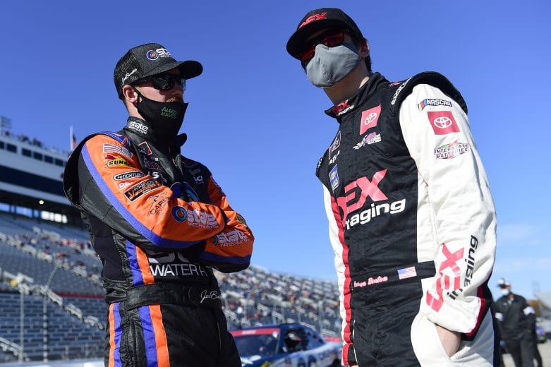 MARTINSVILLE, VIRGINIA - OCTOBER 31: Jeb Burton, driver of the #8 State Water Heaters Chevrolet, and Harrison Burton, driver of the #20 DEX Imaging Toyota, talk on the grid prior to  the NASCAR Xfinity Series Draft Top 250 at Martinsville Speedway on October 31, 2020 in Martinsville, Virginia. (Photo by Jared C. Tilton/Getty Images) | Getty Images