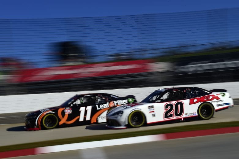 MARTINSVILLE, VIRGINIA - OCTOBER 31: Justin Haley, driver of the #11 LeafFilter Gutter Protection Chevrolet, and Harrison Burton, driver of the #20 DEX Imaging Toyota, race during the NASCAR Xfinity Series Draft Top 250 at Martinsville Speedway on October 31, 2020 in Martinsville, Virginia. (Photo by Jared C. Tilton/Getty Images) | Getty Images