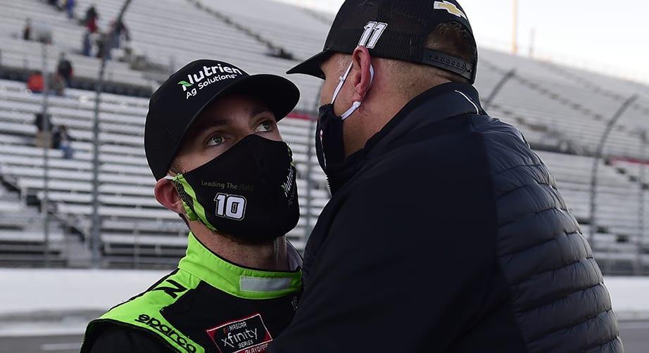 MARTINSVILLE, VIRGINIA - OCTOBER 31: Ross Chastain, driver of the #10 Nutrien Ag Solutions Chevrolet, is embraced after  the NASCAR Xfinity Series Draft Top 250 at Martinsville Speedway on October 31, 2020 in Martinsville, Virginia. (Photo by Jared C. Tilton/Getty Images) | Getty Images