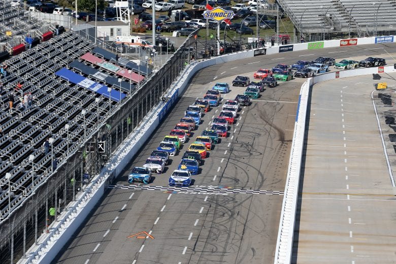 MARTINSVILLE, VIRGINIA - NOVEMBER 01: Martin Truex Jr., driver of the #19 Auto-Owners Insurance Toyota, and Brad Keselowski, driver of the #2 Dent Wizard Ford, lead the field to start the NASCAR Cup Series Xfinity 500 at Martinsville Speedway on November 01, 2020 in Martinsville, Virginia. (Photo by Brian Lawdermilk/Getty Images) | Getty Images