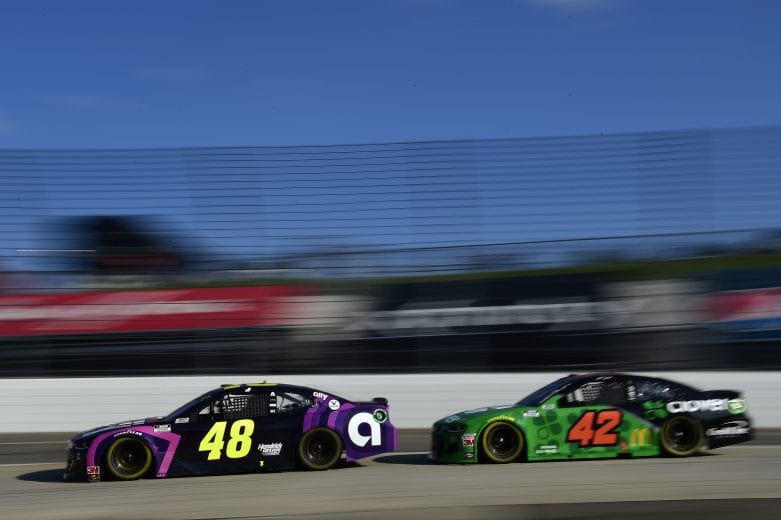 MARTINSVILLE, VIRGINIA - NOVEMBER 01: Jimmie Johnson, driver of the #48 Sign for Jimmie Chevrolet, and Matt Kenseth, driver of the #42 Chevrolet, race during the NASCAR Cup Series Xfinity 500 at Martinsville Speedway on November 01, 2020 in Martinsville, Virginia. (Photo by Jared C. Tilton/Getty Images) | Getty Images