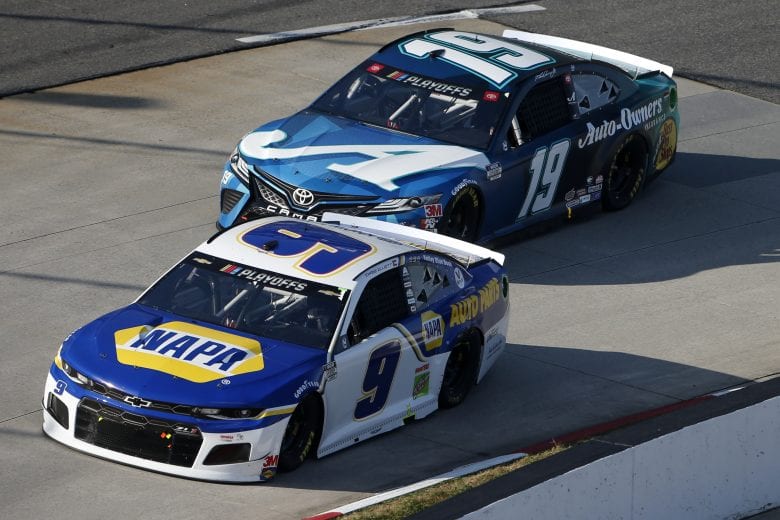 MARTINSVILLE, VIRGINIA - NOVEMBER 01: Chase Elliott, driver of the #9 NAPA Auto Parts Chevrolet, and Martin Truex Jr., driver of the #19 Auto-Owners Insurance Toyota, race during the NASCAR Cup Series Xfinity 500 at Martinsville Speedway on November 01, 2020 in Martinsville, Virginia. (Photo by Brian Lawdermilk/Getty Images) | Getty Images