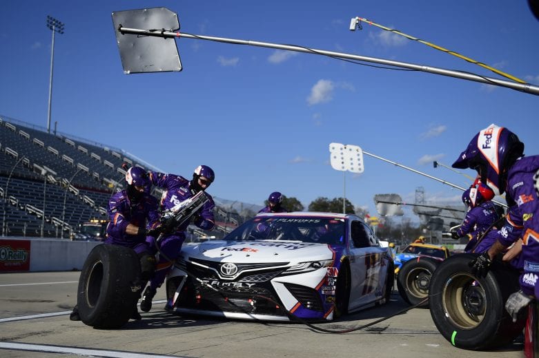 MARTINSVILLE, VIRGINIA - NOVEMBER 01: Denny Hamlin, driver of the #11 FedEx Ground Toyota, pits during the NASCAR Cup Series Xfinity 500 at Martinsville Speedway on November 01, 2020 in Martinsville, Virginia. (Photo by Jared C. Tilton/Getty Images) | Getty Images