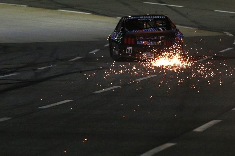 MARTINSVILLE, VIRGINIA - NOVEMBER 01: Kevin Harvick, driver of the #4 Mobil 1 Ford, drives with sparks after an on-track incident on the last lap of the NASCAR Cup Series Xfinity 500 at Martinsville Speedway on November 01, 2020 in Martinsville, Virginia. (Photo by Brian Lawdermilk/Getty Images) | Getty Images
