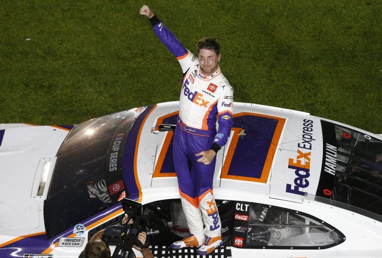 DAYTONA BEACH, FLORIDA - FEBRUARY 17: Denny Hamlin, driver of the #11 FedEx Express Toyota, celebrates after winning the NASCAR Cup Series 62nd Annual Daytona 500 at Daytona International Speedway on February 16, 2020 in Daytona Beach, Florida. (Photo by Brian Lawdermilk/Getty Images) | Getty Images