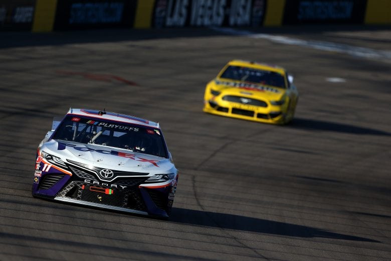 LAS VEGAS, NEVADA - SEPTEMBER 27: Denny Hamlin, driver of the #11 FedEx Office Toyota, leads Joey Logano, driver of the #22 Pennzoil Ford, during the NASCAR Cup Series South Point 400 at Las Vegas Motor Speedway on September 27, 2020 in Las Vegas, Nevada. (Photo by Brian Lawdermilk/Getty Images) | Getty Images