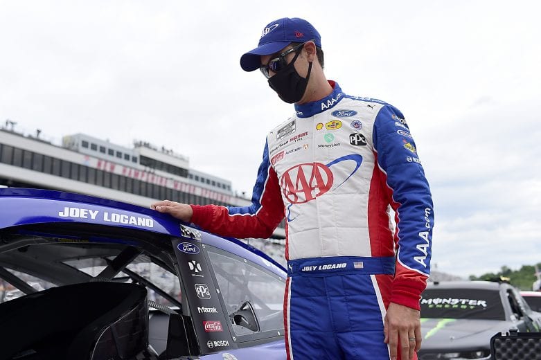 LOUDON, NEW HAMPSHIRE - AUGUST 02: Joey Logano, driver of the #22 AAA Insurance Ford, waits on the grid prior to the NASCAR Cup Series Foxwoods Resort Casino 301 at New Hampshire Motor Speedway on August 02, 2020 in Loudon, New Hampshire. (Photo by Jared C. Tilton/Getty Images) | Getty Images