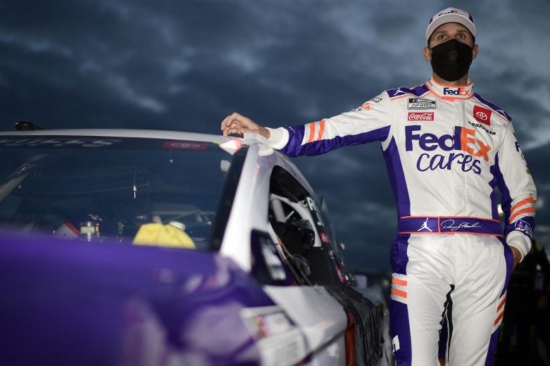 RICHMOND, VIRGINIA - SEPTEMBER 12: Denny Hamlin, driver of the #11 FedEx Cars Toyota, waits on the grid prior to the NASCAR Cup Series Federated Auto Parts 400 at Richmond Raceway on September 12, 2020 in Richmond, Virginia. (Photo by Jared C. Tilton/Getty Images) | Getty Images