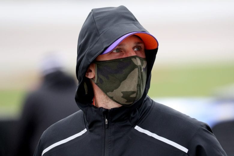 KANSAS CITY, KANSAS - OCTOBER 18: Denny Hamlin, driver of the #11 FedEx Freight Toyota, waits on the grid prior to the NASCAR Cup Series Hollywood Casino 400 at Kansas Speedway on October 18, 2020 in Kansas City, Kansas. (Photo by Chris Graythen/Getty Images) | Getty Images