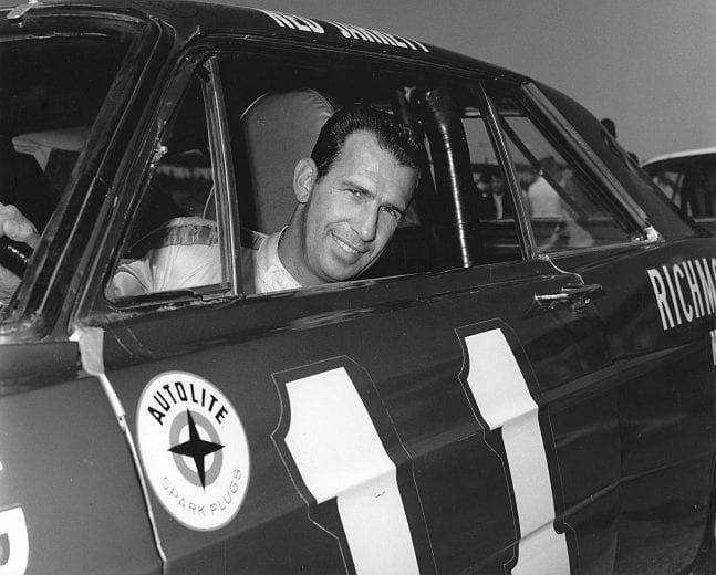 DAYTONA BEACH, FL — February 1966:  Ned Jarrett began his final year on the NASCAR Cup circuit by finishing seventh in the Daytona 500 at Daytona International Speedway behind the wheel of car owner Bondy Long's Ford Galaxie.  (Photo by ISC Images & Archives via Getty Images)