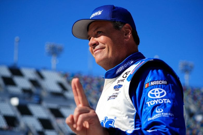 DAYTONA BEACH, FL - FEBRUARY 19:  Michael Waltrip, driver of the #15 Aaron's Toyota, walks on the grid during qualifying for the Monster Energy NASCAR Cup Series 59th Annual DAYTONA 500 at Daytona International Speedway on February 19, 2017 in Daytona Beach, Florida.  (Photo by Cliff Hawkins/Getty Images) | Getty Images