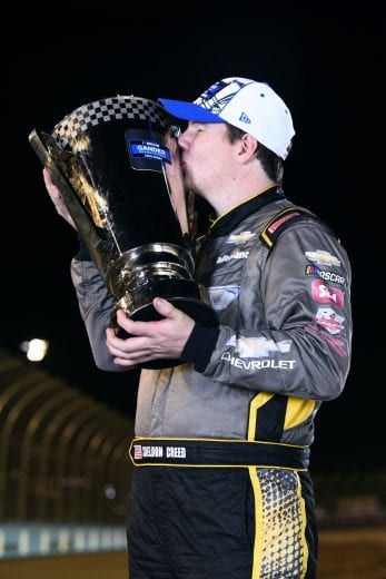 AVONDALE, ARIZONA - NOVEMBER 06: Sheldon Creed, driver of the #2 Chevy Accessories/Trench Shoring Chevrolet, poses for a photo after winning the NASCAR Gander RV & Outdoors Truck Series Championship at Phoenix Raceway on November 06, 2020 in Avondale, Arizona. (Photo by Jared C. Tilton/Getty Images) | Getty Images