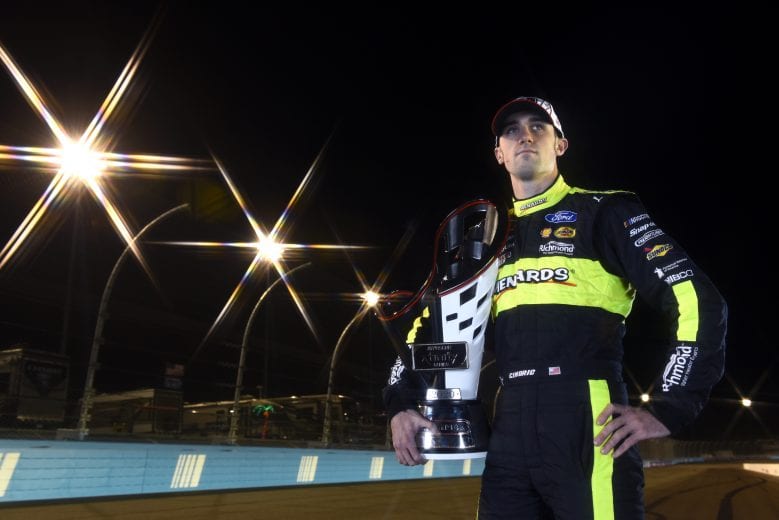 AVONDALE, ARIZONA - NOVEMBER 07: (EDITOR'S NOTE: This image was created using a starburst filter) Austin Cindric, driver of the #22 Menards/Richmond Ford, poses for a photo after winning the NASCAR Xfinity Series Desert Diamond Casino West Valley 200 and the 2020 NASCAR Xfinity Series Championship at Phoenix Raceway on November 07, 2020 in Avondale, Arizona. (Photo by Jared C. Tilton/Getty Images) | Getty Images