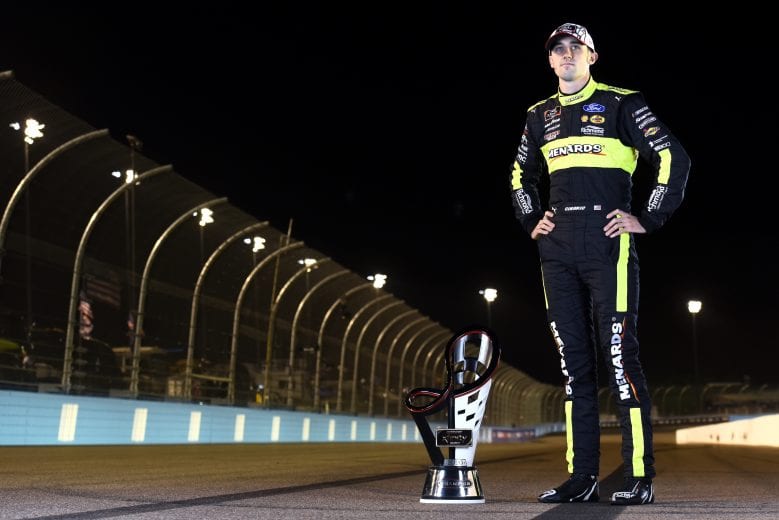 AVONDALE, ARIZONA - NOVEMBER 07: Austin Cindric, driver of the #22 Menards/Richmond Ford, poses for a photo after winning the NASCAR Xfinity Series Desert Diamond Casino West Valley 200 and the 2020 NASCAR Xfinity Series Championship at Phoenix Raceway on November 07, 2020 in Avondale, Arizona. (Photo by Jared C. Tilton/Getty Images) | Getty Images