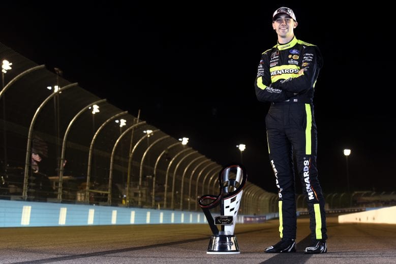 AVONDALE, ARIZONA - NOVEMBER 07: Austin Cindric, driver of the #22 Menards/Richmond Ford, poses for a photo after winning the NASCAR Xfinity Series Desert Diamond Casino West Valley 200 and the 2020 NASCAR Xfinity Series Championship at Phoenix Raceway on November 07, 2020 in Avondale, Arizona. (Photo by Jared C. Tilton/Getty Images) | Getty Images