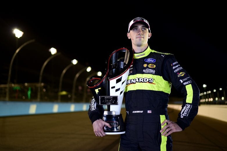 AVONDALE, ARIZONA - NOVEMBER 07: Austin Cindric, driver of the #22 Menards/Richmond Ford, poses for a photo after winning the NASCAR Xfinity Series Desert Diamond Casino West Valley 200 and the 2020 NASCAR Xfinity Series Championship at Phoenix Raceway on November 07, 2020 in Avondale, Arizona. (Photo by Jared C. Tilton/Getty Images) | Getty Images