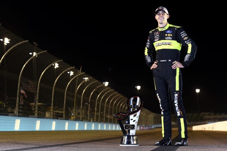 AVONDALE, ARIZONA - NOVEMBER 07: Austin Cindric, driver of the #22 Menards/Richmond Ford, poses for a photo after winning the NASCAR Xfinity Series Desert Diamond Casino West Valley 200 and the 2020 NASCAR Xfinity Series Championship at Phoenix Raceway on November 07, 2020 in Avondale, Arizona. (Photo by Jared C. Tilton/Getty Images) | Getty Images