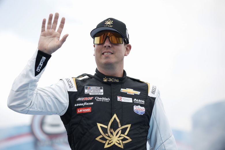 Kyle Busch waves during driver intros