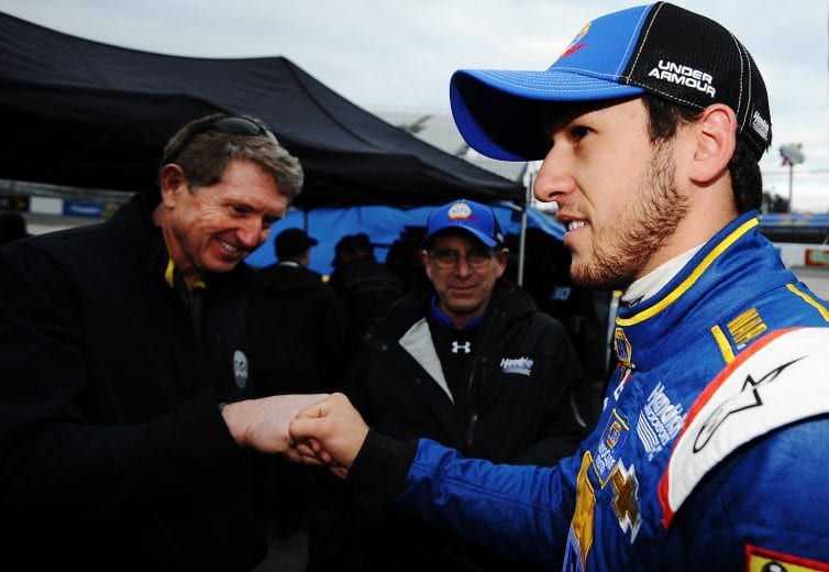 MARTINSVILLE, VA - MARCH 27: NASCAR Hall of Famer Bill Elliott (left) congratulates his son Chase Elliott, driver of the #25 NAPA AUTO PARTS Chevrolet, after qualifying for the NASCAR Sprint Cup Series STP 500 at Martinsville Speedway on March 27, 2015 in Martinsville, Virginia. This will mark Chase Elliott's first NASCAR Sprint Cup Series start. (Photo by Rainier Ehrhardt/NASCAR via Getty Images)