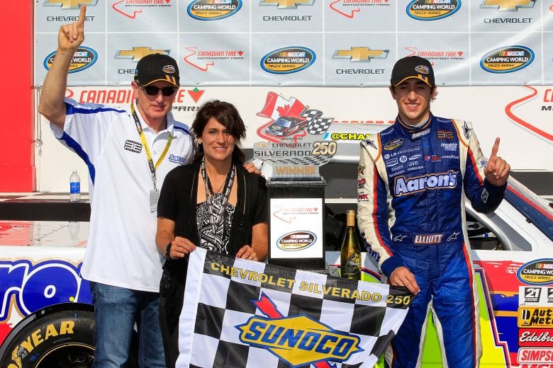 BOWMANVILLE, ON - SEPTEMBER 1: Chase Elliott ( r ), driver of the #94 Aaron's Dream Machine/Hendrickcars.com Chevrolet, celebrates in victory lane with his father, Bill ( l ), and mother Cindy ( m ), after winning the NASCAR Camping World Truck Series Chevrolet Silverado 250 at Canadian Tire Motorsport Park on September 1, 2013 in Bowmanville, Canada. (Photo by Geoff Burke/NASCAR via Getty Images)