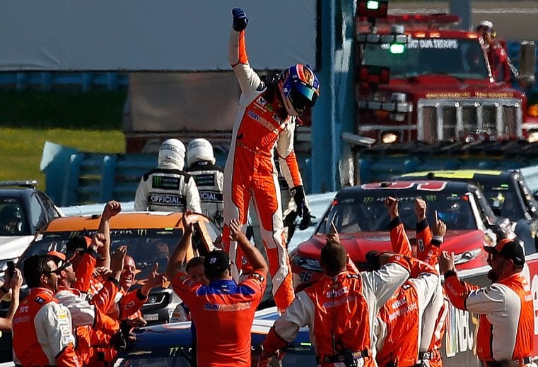 WATKINS GLEN, NY - AUGUST 05: Chase Elliott, driver of the #9 SunEnergy1 Chevrolet, celebrates is victory with his crew in the Monster Energy NASCAR Cup Series GoBowling at The Glen at Watkins Glen International on August 5, 2018 in Watkins Glen, New York. (Photo by Jeff Zelevansky/Getty Images) | Getty Images