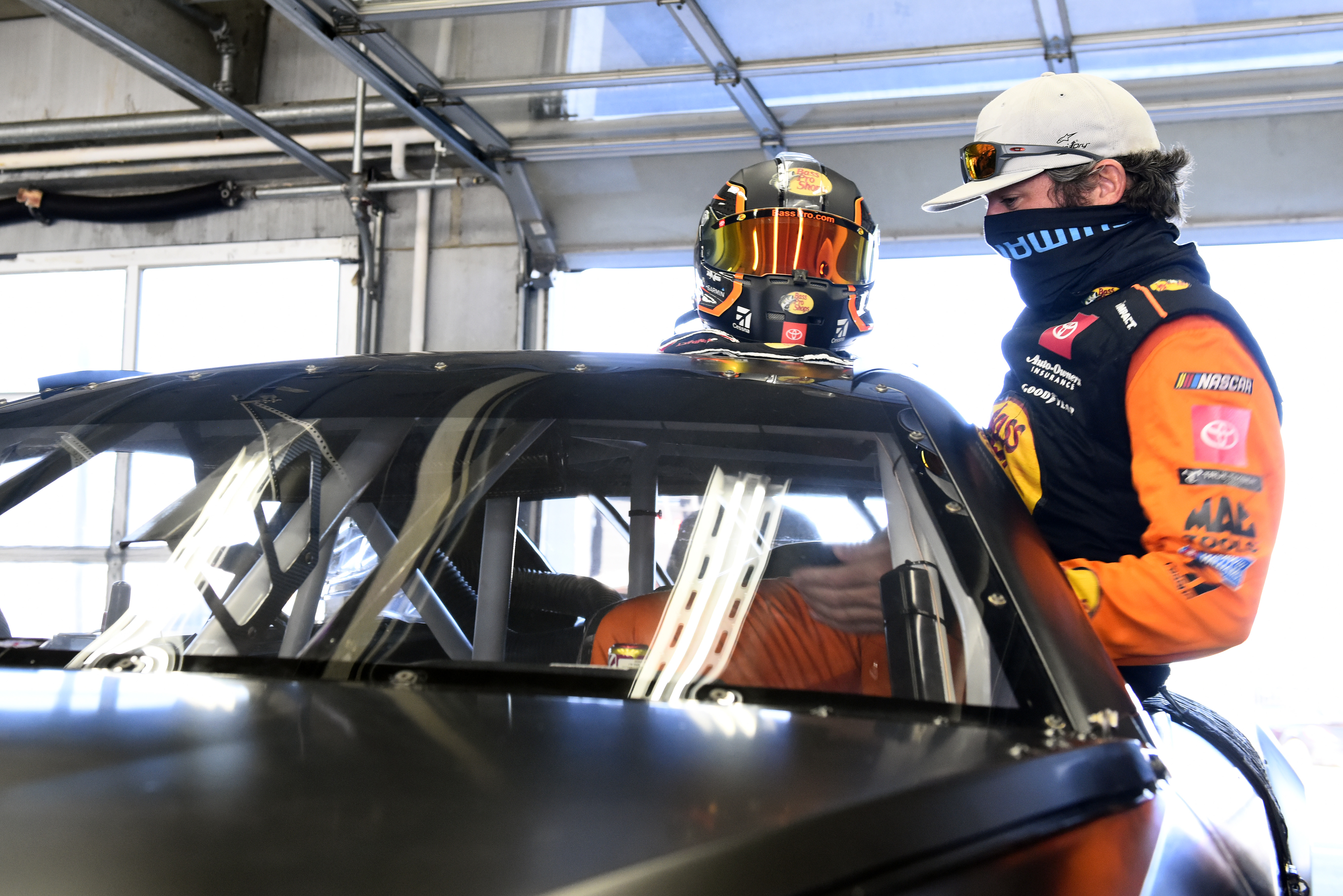CONCORD, NORTH CAROLINA - NOVEMBER 16: Martin Truex Jr. climbs into the NASCAR Next Gen car during the NASCAR Cup Series test at Charlotte Motor Speedway on November 16, 2020 in Concord, North Carolina. (Photo by Jared C. Tilton/Getty Images) | Getty Images