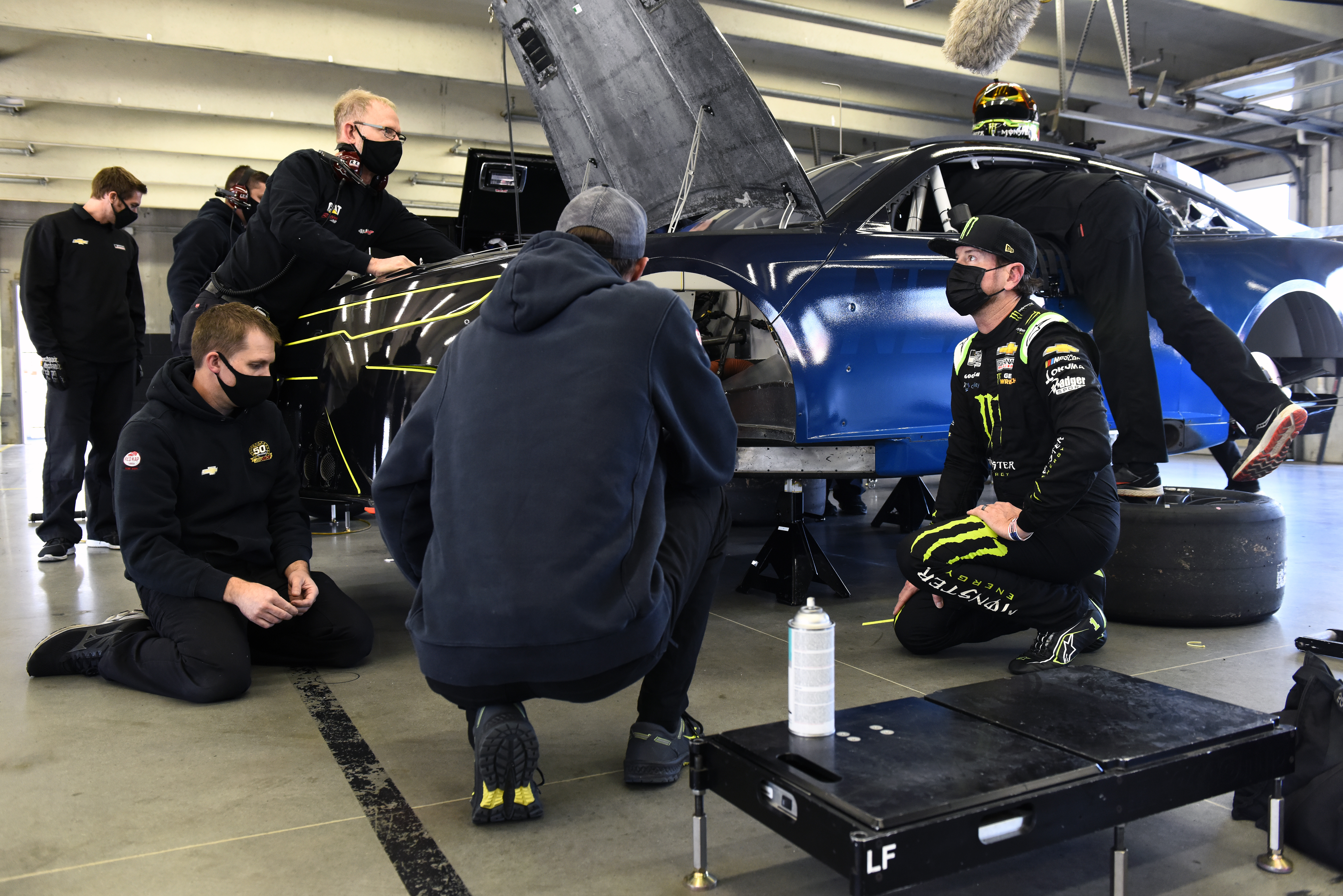 CONCORD, NORTH CAROLINA - NOVEMBER 16: Kurt Busch speaks with team members in the garage area during the NASCAR Cup Series test at Charlotte Motor Speedway on November 16, 2020 in Concord, North Carolina. (Photo by Jared C. Tilton/Getty Images) | Getty Images