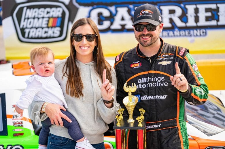 Josh Berry, driver of the #88 All Things Automotive Chevrolet, with his wife and child during Championship Weekend for the NASCAR Advance Auto Parts Weekly Series at Southern National Motorsports Park in Kenly, North Carolina on October18, 2020. (Jacob Kupferman/NASCAR)