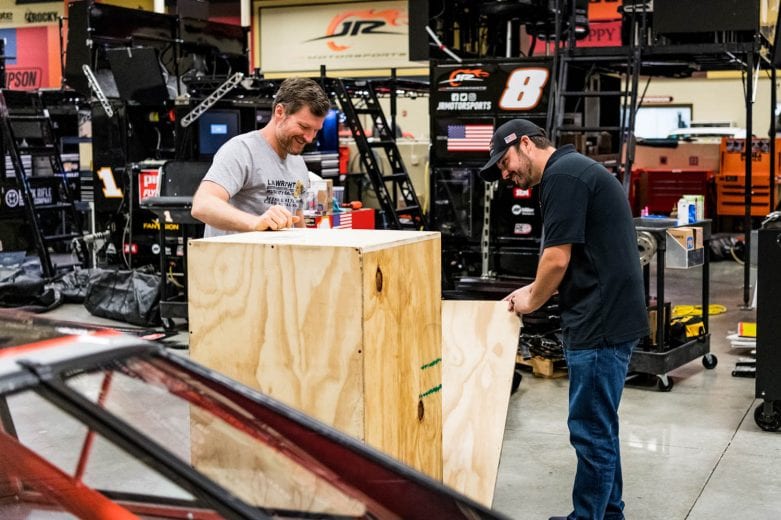 Advance Auto Parts delivers the weekly series championship trophy to Josh Berry, driver of the #88 All Things Automotive Chevrolet, (driver) and Dale Earnhardt Jr. (car owner) at the JR Motorsports facility in Mooresville, NC. November 17, 2020. (Reagen Lunn/NASCAR)