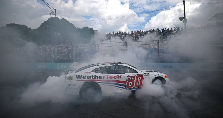 Shane van Gisbergen does a burnout at Chicago.