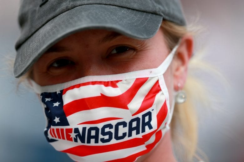 BRISTOL, TENNESSEE - SEPTEMBER 19: a fan with NASCAR mask poses for a photo prior to the NASCAR Cup Series Bass Pro Shops Night Race at Bristol Motor Speedway on September 19, 2020 in Bristol, Tennessee. (Photo by Sean Gardner/Getty Images) | Getty Images