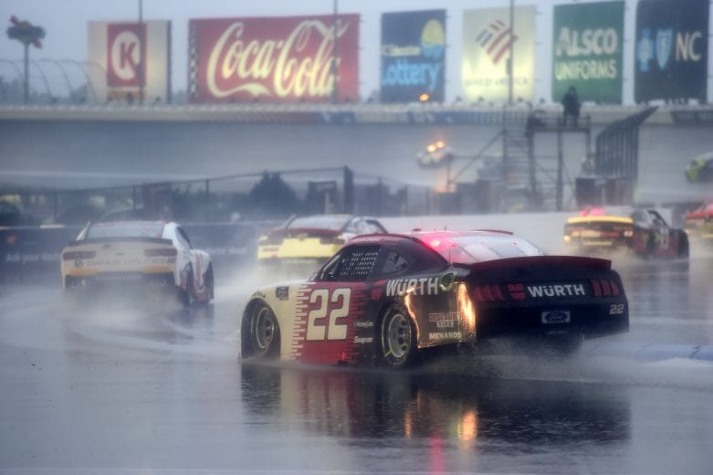CONCORD, NORTH CAROLINA - OCTOBER 10: Austin Cindric, driver of the #22 Wurth Ford, drives in the rain during the NASCAR Xfinity Series Drive for the Cure 250 presented by Blue Cross Blue Shield of North Carolina at Charlotte Motor Speedway on October 10, 2020 in Concord, North Carolina. (Photo by Jared C. Tilton/Getty Images) | Getty Images