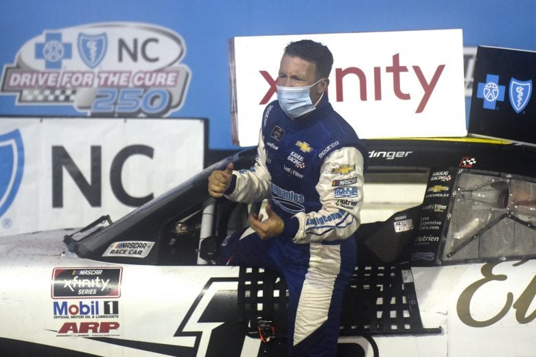 CONCORD, NORTH CAROLINA - OCTOBER 10: AJ Allmendinger, driver of the #16 Ellsworth Advisors Chevrolet, celebrates in victory lane after winning the NASCAR Xfinity Series Drive for the Cure 250 presented by Blue Cross Blue Shield of North Carolina at Charlotte Motor Speedway on October 10, 2020 in Concord, North Carolina. (Photo by Jared C. Tilton/Getty Images) | Getty Images