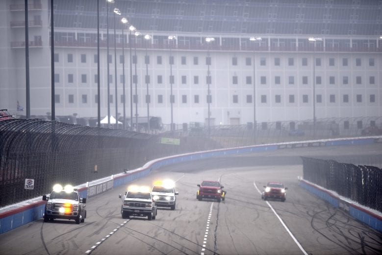 FORT WORTH, TEXAS - OCTOBER 25: Track officials use a jet dryer to dry the track during the NASCAR Cup Series Autotrader EchoPark Automotive 500 at Texas Motor Speedway on October 25, 2020 in Fort Worth, Texas. (Photo by Jared C. Tilton/Getty Images) | Getty Images