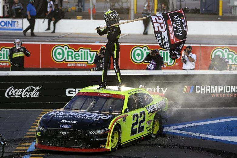AVONDALE, ARIZONA - NOVEMBER 07: Austin Cindric, driver of the #22 Menards/Richmond Ford, celebrates after winning the NASCAR Xfinity Series Desert Diamond Casino West Valley 200 and the 2020 NASCAR Xfinity Series Championship at Phoenix Raceway on November 07, 2020 in Avondale, Arizona. (Photo by Brian Lawdermilk/Getty Images) | Getty Images