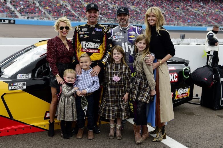 AVONDALE, ARIZONA - NOVEMBER 08: Clint Bowyer, driver of the #14 Rush/HAAS CNC Ford, and Jimmie Johnson, driver of the #48 Ally Chevrolet, pose with their family , Lorra Bowyer, Chandra Johnson, Cash Bowyer, Presley Bowyer. Lydia Norriss Johnson and Genevieve Johnson prior to the NASCAR Cup Series Season Finale 500 at Phoenix Raceway on November 08, 2020 in Avondale, Arizona. Clint Bowyer and Jimmie Johnson is scheduled to retire from full-time NASCAR racing after 2020. (Photo by Jared C. Tilton/Getty Images) | Getty Images