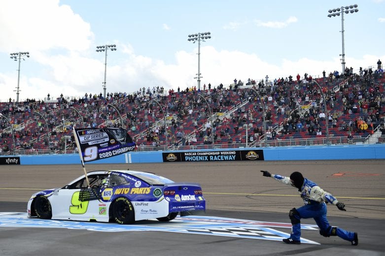 AVONDALE, ARIZONA - NOVEMBER 08: Chase Elliott, driver of the #9 NAPA Auto Parts Chevrolet, and pit crew member celebrate after winning the NASCAR Cup Series Season Finale 500 and the 2020 NASCAR Cup Series Championship at Phoenix Raceway on November 08, 2020 in Avondale, Arizona. (Photo by Jared C. Tilton/Getty Images) | Getty Images