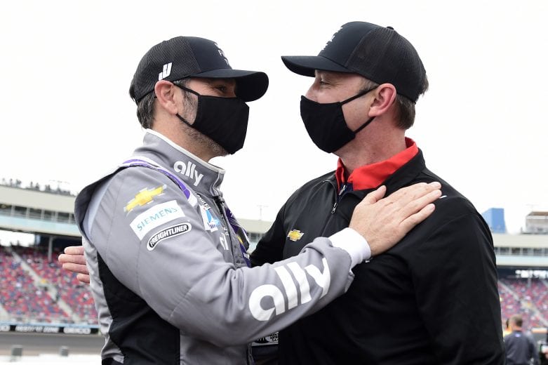 AVONDALE, ARIZONA - NOVEMBER 08: Jimmie Johnson, driver of the #48 Ally Chevrolet, and crew chief Chad Knaus embrace on the grid prior to the NASCAR Cup Series Season Finale 500 at Phoenix Raceway on November 08, 2020 in Avondale, Arizona. Jimmie Johnson is scheduled to retire from full-time NASCAR racing after 2020. (Photo by Jared C. Tilton/Getty Images) | Getty Images