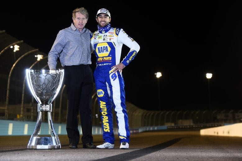 AVONDALE, ARIZONA - NOVEMBER 08:
Chase Elliott, driver of the #9 NAPA Auto Parts Chevrolet, and his father Bill Elliott pose for a photo after winning the NASCAR Cup Series Season Finale 500 and the 2020 NASCAR Cup Series Championship at Phoenix Raceway on November 08, 2020 in Avondale, Arizona. (Photo by Jared C. Tilton/Getty Images) | Getty Images