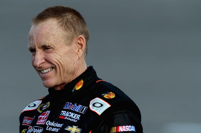 RICHMOND, VA - SEPTEMBER 06: Mark Martin, driver of the #14 Bass Pro Shops / Mobil 1 Chevrolet, looks on from the grid during qualifying for the NASCAR Sprint Cup Series Federated Auto Parts 400 at Richmond International Raceway on September 6, 2013 in Richmond, Virginia. (Photo by Patrick Smith/Getty Images) | Getty Images