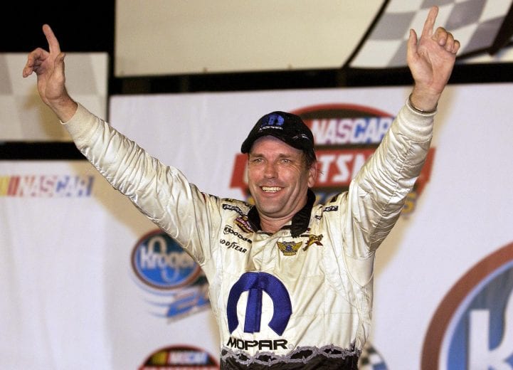 RICHMOND,VA.- SEPTEMBER 9: Ted Musgrave, driver of the #1 Mopar Dodge , celebrates winning the NASCAR Craftsman Truck Series Kroger 200, on September 9, 2004 at Richmond International Speedway in Richmond, Virginia. (Photo By Rusty Jarrett/Getty Images) | Getty Images