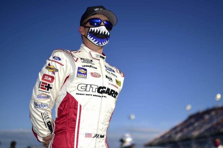 DARLINGTON, SOUTH CAROLINA - SEPTEMBER 06: John H. Nemechek, driver of the #38 Citgard Ford, walks  the grid prior to the NASCAR Cup Series Cook Out Southern 500 at Darlington Raceway on September 06, 2020 in Darlington, South Carolina. (Photo by Jared C. Tilton/Getty Images) | Getty Images