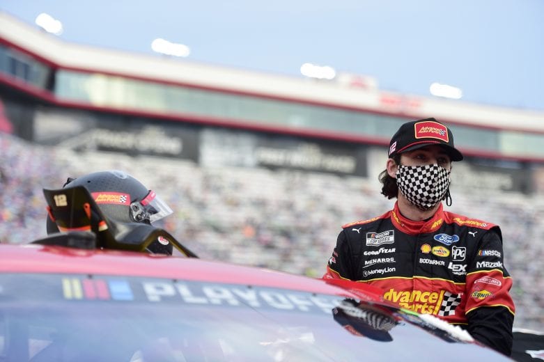 BRISTOL, TENNESSEE - SEPTEMBER 19: Ryan Blaney, driver of the #12 Advance Auto Parts Ford, stands on the grid prior to the NASCAR Cup Series Bass Pro Shops Night Race at Bristol Motor Speedway on September 19, 2020 in Bristol, Tennessee. (Photo by Jared C. Tilton/Getty Images) | Getty Images