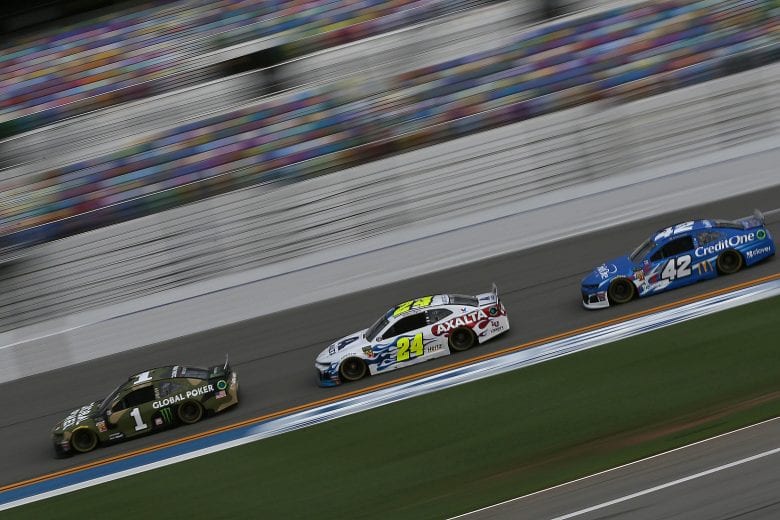 DAYTONA BEACH, FLORIDA - JULY 04: Kurt Busch, driver of the #1 Global Poker Chevrolet, William Byron, driver of the #24 Axalta Patriotic Chevrolet, and Kyle Larson, driver of the #42 Credit One Bank Chevrolet, drive during practice for the Monster Energy NASCAR Cup Series Coke Zero Sugar 400 at Daytona International Speedway on July 04, 2019 in Daytona Beach, Florida. (Photo by Matt Sullivan/Getty Images) | Getty Images