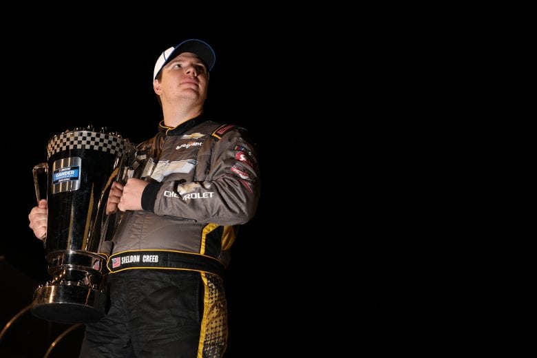 AVONDALE, ARIZONA - NOVEMBER 06: Sheldon Creed, driver of the #2 Chevy Accessories/Trench Shoring Chevrolet, poses for a photo after winning the NASCAR Gander RV & Outdoors Truck Series Championship at Phoenix Raceway on November 06, 2020 in Avondale, Arizona. (Photo by Christian Petersen/Getty Images) | Getty Images