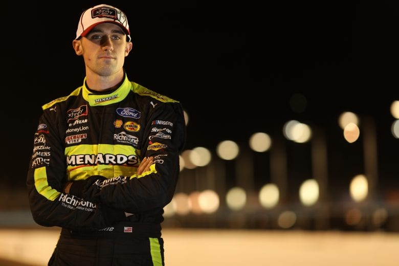 AVONDALE, ARIZONA - NOVEMBER 07: Austin Cindric, driver of the #22 Menards/Richmond Ford, poses for a photo after winning the NASCAR Xfinity Series Desert Diamond Casino West Valley 200 and the 2020 NASCAR Xfinity Series Championship at Phoenix Raceway on November 07, 2020 in Avondale, Arizona. (Photo by Christian Petersen/Getty Images) | Getty Images